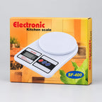 SF-400 digital kitchen scale in retail packaging with LCD display and weighing platform